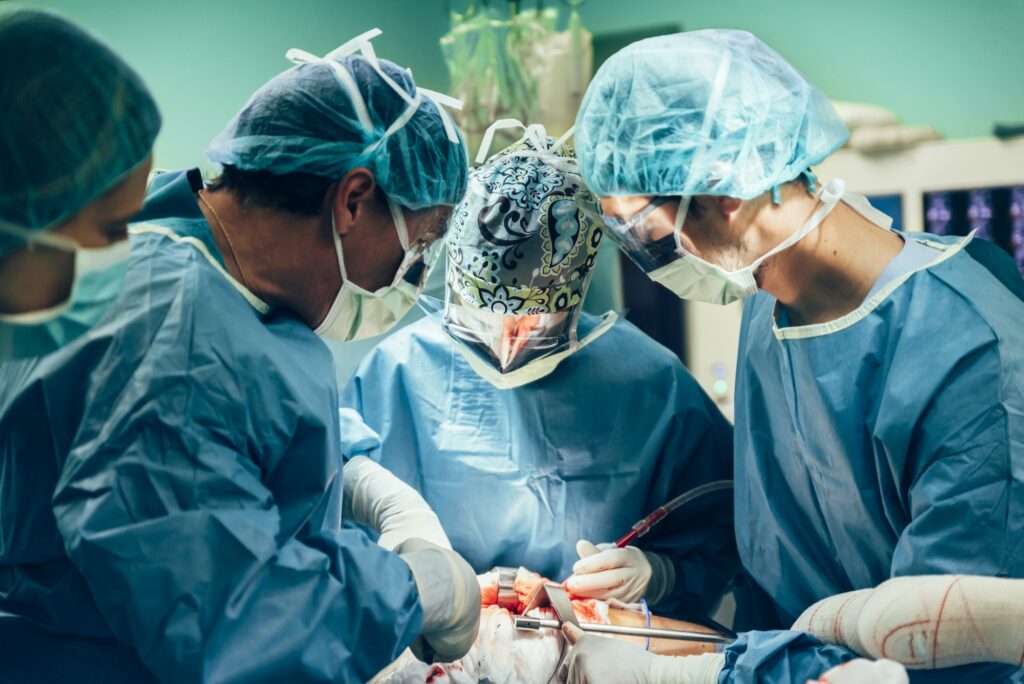 Team of Surgeons Operating.